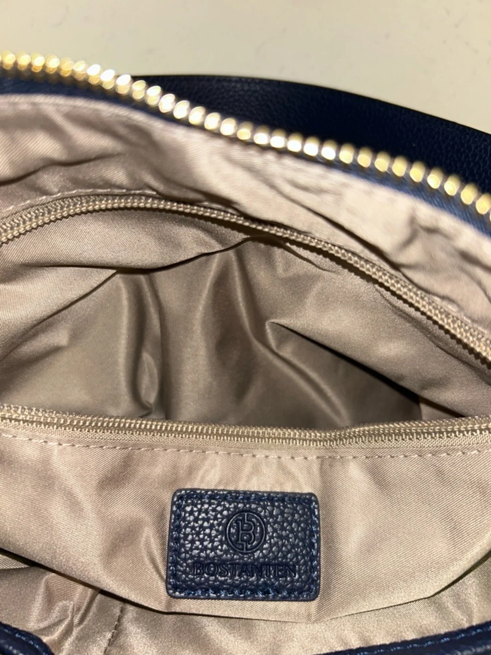 Bostanten Pebbled Navy Shoulder Bag with Gold Charm